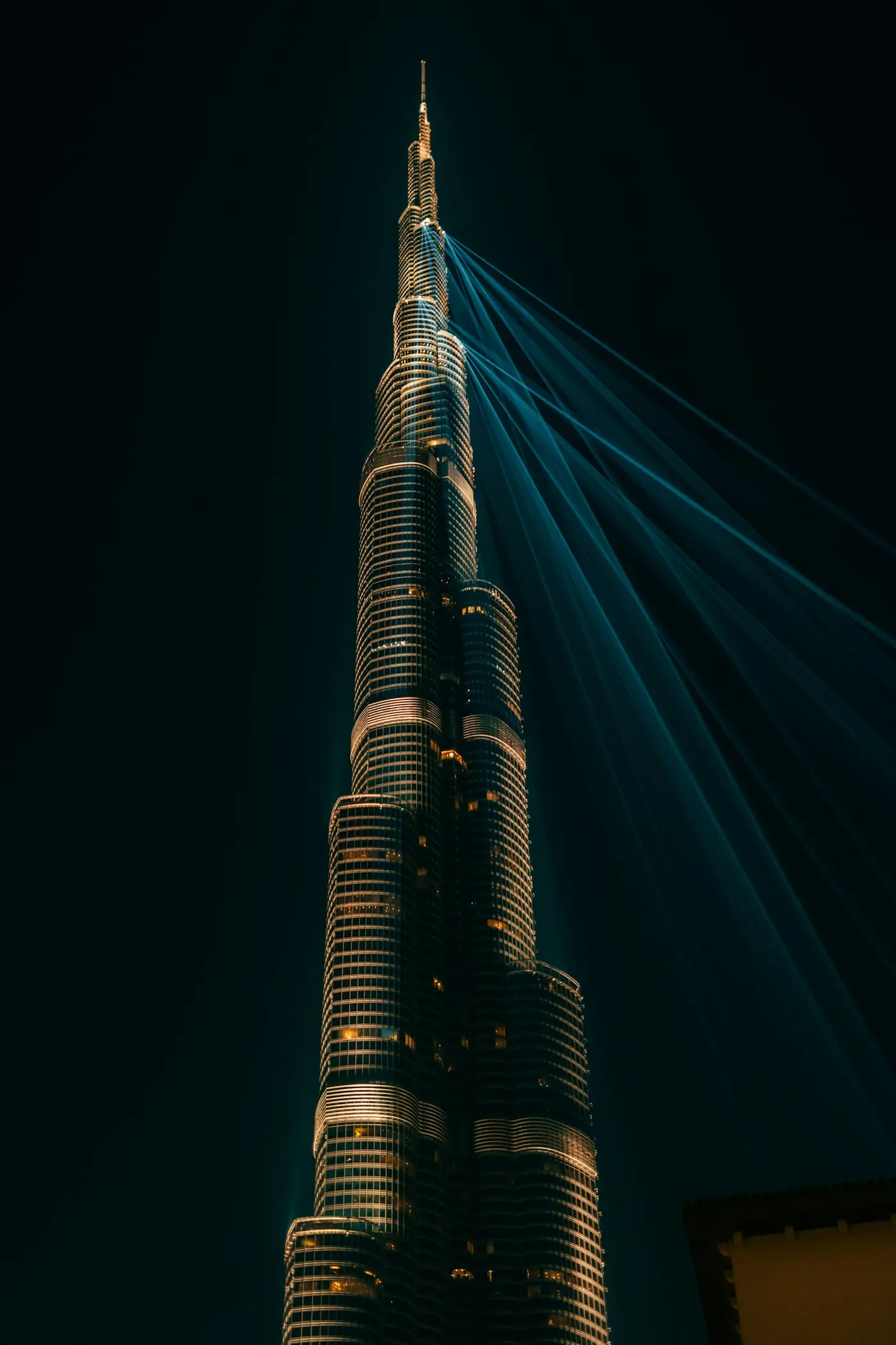 The Burj Khalifa at night, lit against a dark sky
